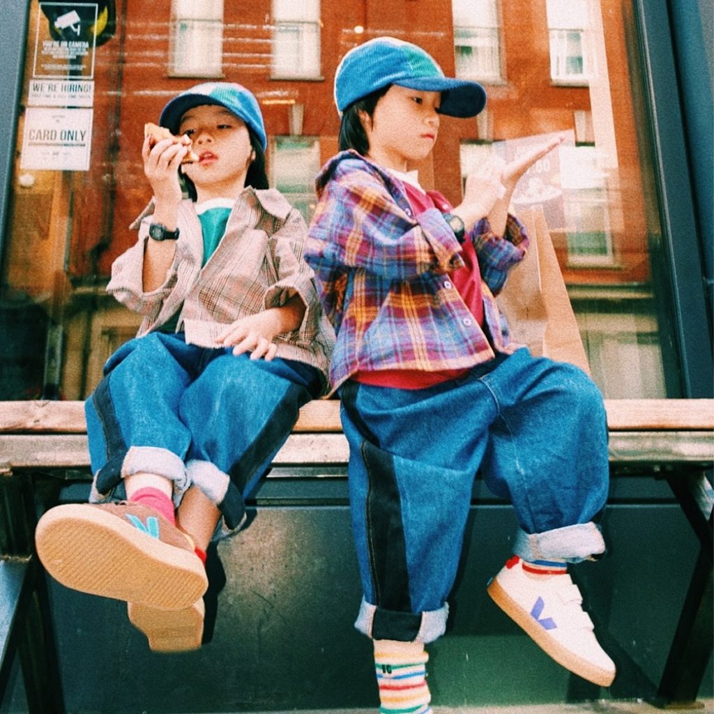 two young boys wearing blue caps and VEJA x JELLYMALLOW collaboration sneakers